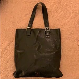 MCM flat leather tote.